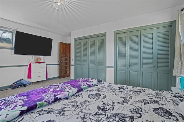 37 Pinewood Dr, North Providence, RI 02904 - carpeted bedroom featuring two closets