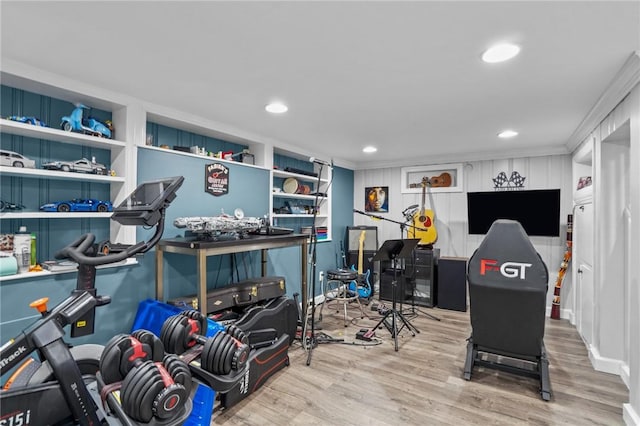 playroom featuring wood finished floors and recessed lighting