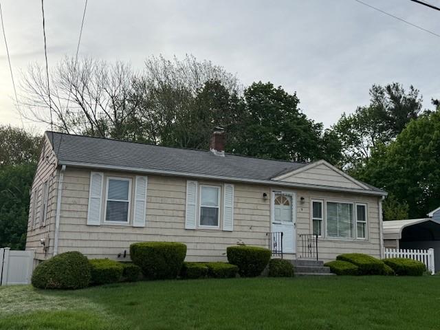 21 Cochran St, West Warwick, RI 02893 - view of front of property with a chimney