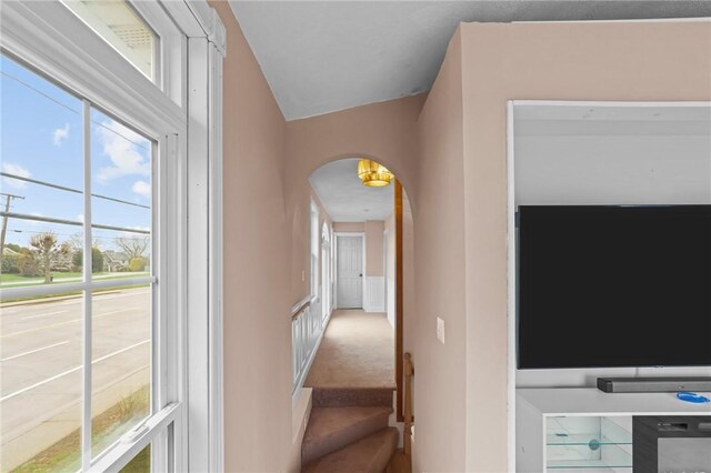 corridor with arched walkways