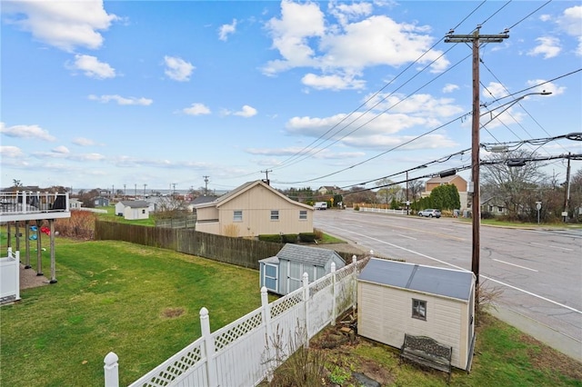 view of yard with a storage unit and an outdoor structure