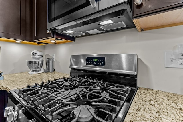 1740 Bulgarmarsh Rd, Tiverton, RI 02878 - kitchen view of stainless steel appliances and dark brown cabinetry