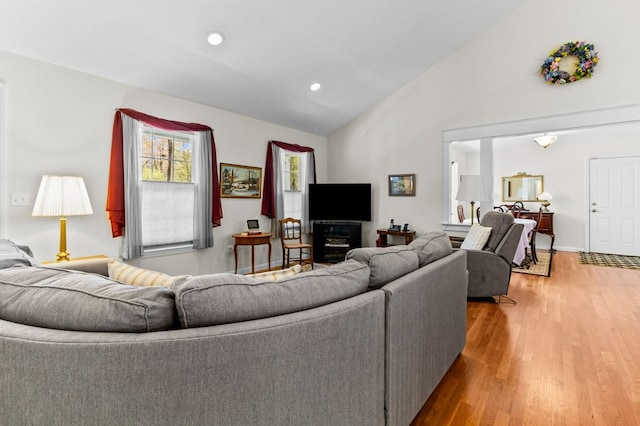 1740 Bulgarmarsh Rd, Tiverton, RI 02878 - living area featuring light wood finished floors, vaulted ceiling, recessed lighting, and baseboards