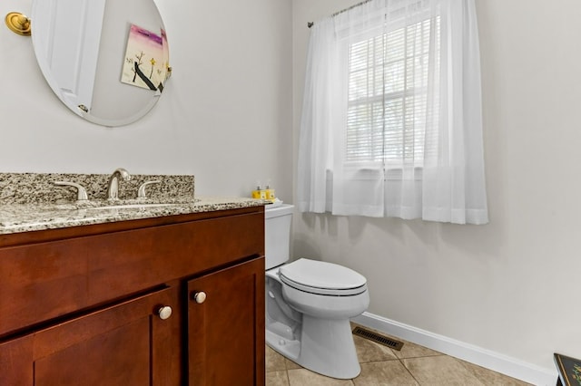 1740 Bulgarmarsh Rd, Tiverton, RI 02878 - half bath with baseboards, tile patterned floors, toilet, and vanity