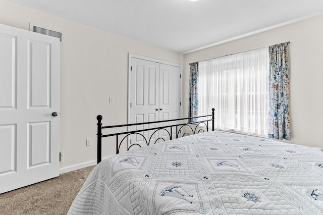 1740 Bulgarmarsh Rd, Tiverton, RI 02878 - bedroom featuring carpet flooring, a closet, and baseboards