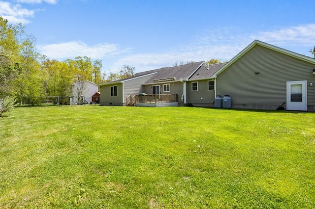 1740 Bulgarmarsh Rd, Tiverton, RI 02878 - rear view of property featuring a deck, a lawn, and crawl space