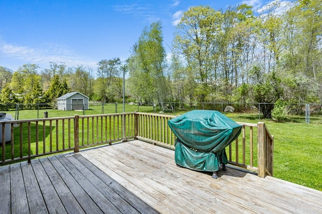 1740 Bulgarmarsh Rd, Tiverton, RI 02878 - wooden deck featuring view of wooded area, a grill, and an outdoor structure