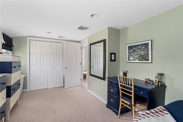 office area with light colored carpet and baseboards