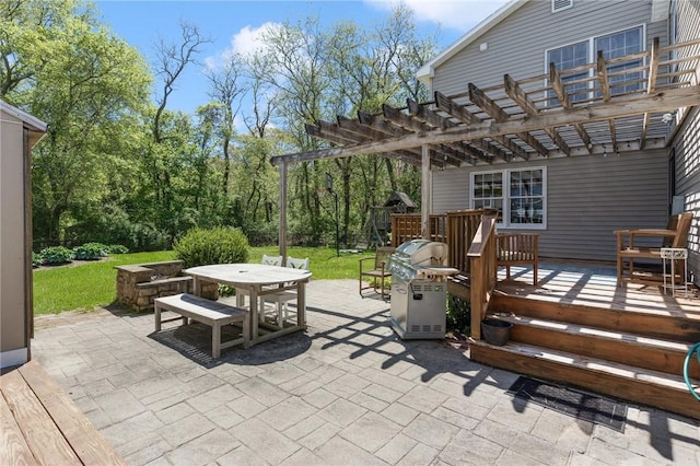 view of patio / terrace with area for grilling, outdoor dining space, a pergola, and a deck