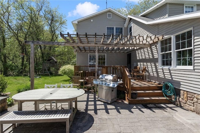 back of property featuring outdoor dining area, a pergola, a patio, a yard, and a deck