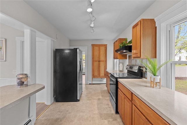 183 Annaquatucket Rd, North Kingstown, RI 02852 - kitchen featuring black / electric stove, freestanding refrigerator, light countertops, and baseboard heating