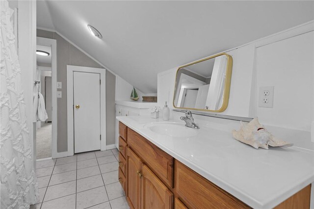 183 Annaquatucket Rd, North Kingstown, RI 02852 - bathroom with lofted ceiling, vanity, and tile patterned flooring