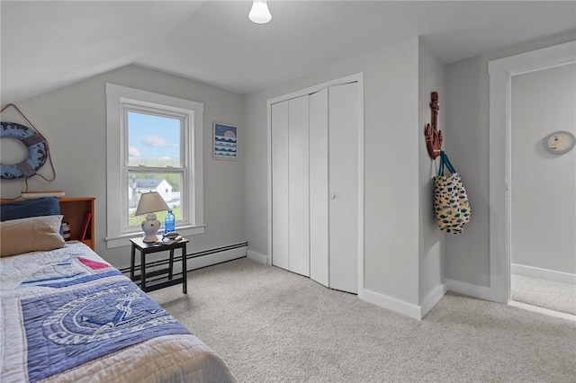 183 Annaquatucket Rd, North Kingstown, RI 02852 - carpeted bedroom with baseboards, vaulted ceiling, a closet, and baseboard heating