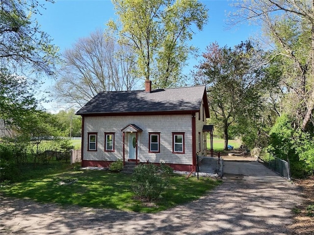 183 Annaquatucket Rd, North Kingstown, RI 02852 - view of front of house featuring asphalt driveway and a chimney