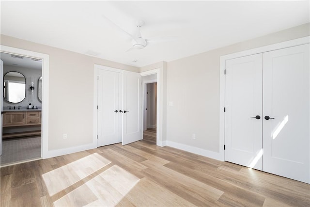 9 Stedman Rd, South Kingstown, RI 02879 - unfurnished bedroom with light wood-style floors and ensuite bath