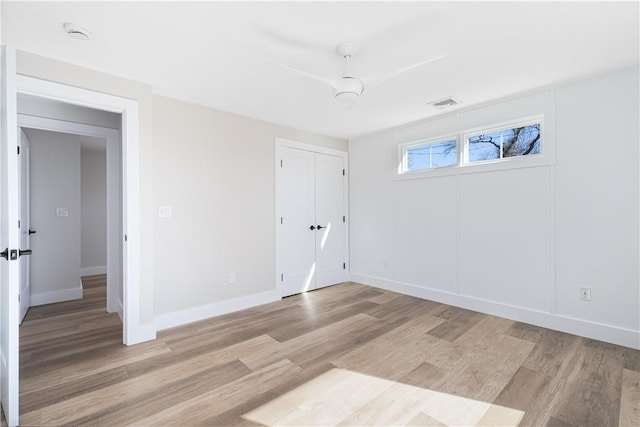 9 Stedman Rd, South Kingstown, RI 02879 - unfurnished bedroom with light wood-type flooring and a closet