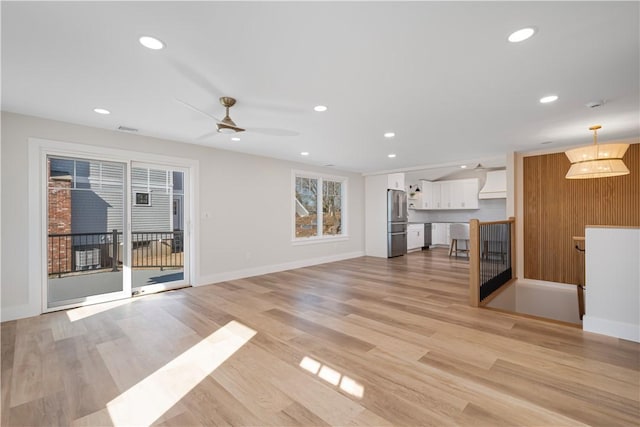 9 Stedman Rd, South Kingstown, RI 02879 - unfurnished living room featuring light wood-style flooring, recessed lighting, and ceiling fan