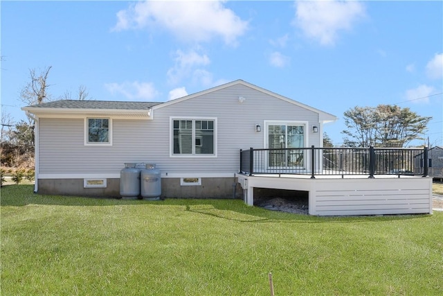 9 Stedman Rd, South Kingstown, RI 02879 - back of property with a deck and a lawn
