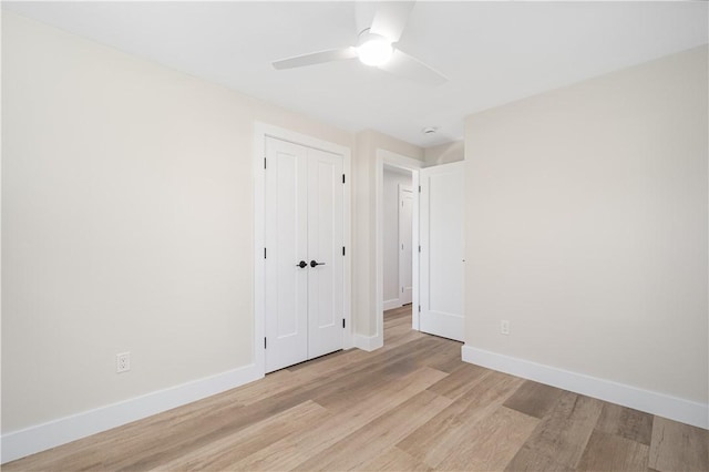 9 Stedman Rd, South Kingstown, RI 02879 - unfurnished bedroom featuring light wood-style floors, a closet, and a ceiling fan