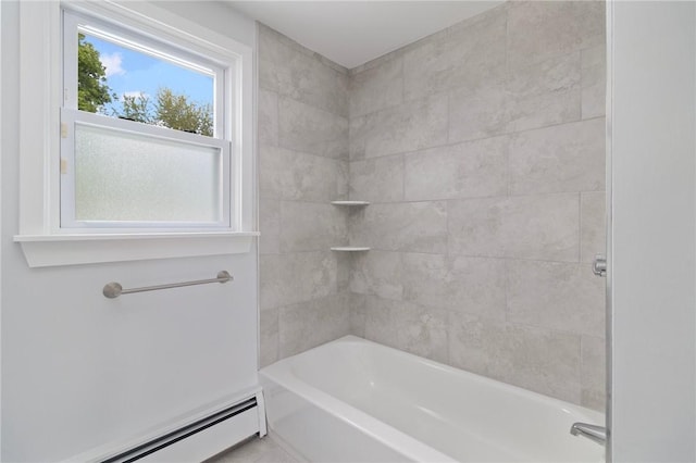 bathroom with a baseboard heating unit and shower / bathtub combination