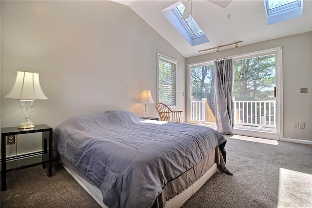 bedroom with a skylight, access to exterior, carpet, and lofted ceiling