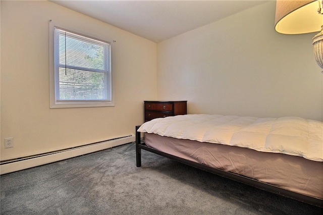 carpeted bedroom featuring a baseboard heating unit