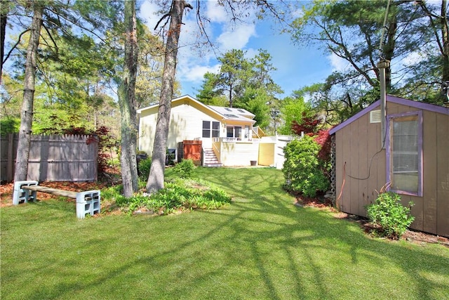 view of yard with a storage unit and an outdoor structure