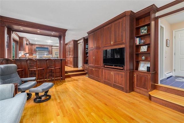 831 N Quidnessett Rd, North Kingstown, RI 02852 - living room with light wood finished floors, baseboard heating, and recessed lighting