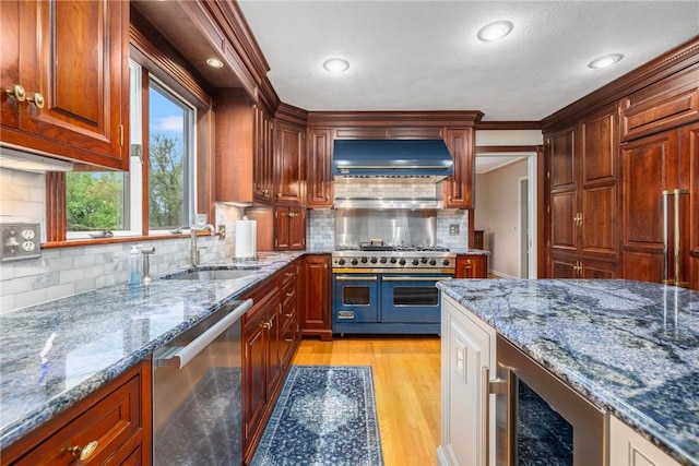 831 N Quidnessett Rd, North Kingstown, RI 02852 - kitchen featuring stainless steel dishwasher, custom exhaust hood, a sink, range with two ovens, and wine cooler