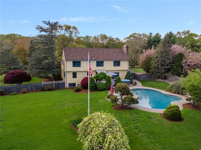 831 N Quidnessett Rd, North Kingstown, RI 02852 - rear view of property with a chimney