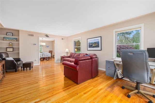 831 N Quidnessett Rd, North Kingstown, RI 02852 - office with light wood-style flooring and baseboards
