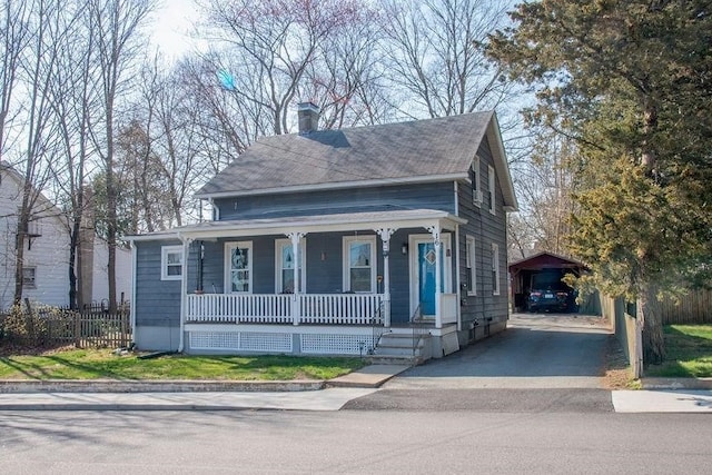16 Gough Ave, West Warwick, RI 02893 - view of front facade with covered porch, asphalt driveway, fence, and a chimney