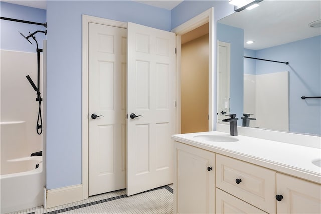 38 Miss Fry Dr, East Greenwich, RI 02818 - full bathroom with double vanity,  shower combination, and recessed lighting
