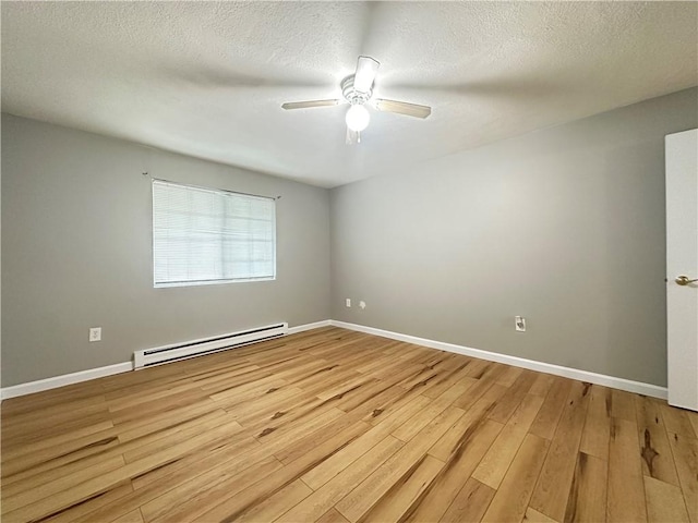 300 Smithfield Rd Unit B3-18, North Providence, RI 02904 - unfurnished room featuring baseboard heating, light wood-type flooring, baseboards, a ceiling fan, and a textured ceiling