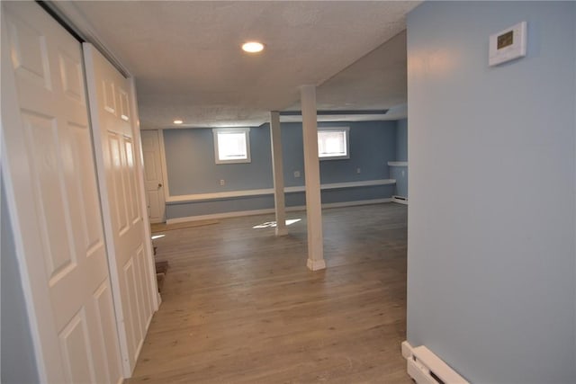 115 Sherman Farm Rd, Burrillville, RI 02830 - basement featuring wood finished floors, recessed lighting, and baseboards