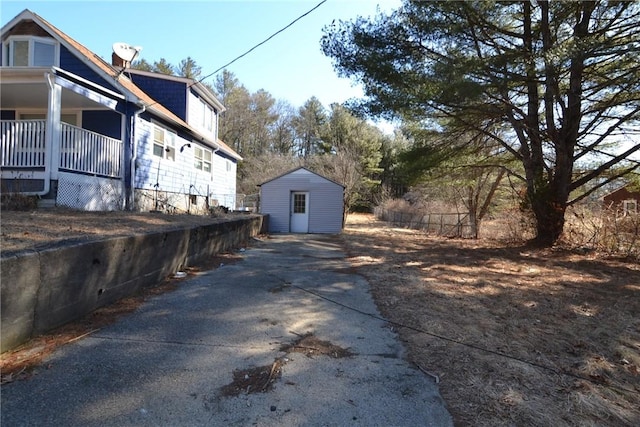 115 Sherman Farm Rd, Burrillville, RI 02830 - view of side of home featuring a shed, an outbuilding, and driveway