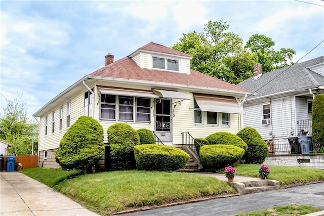 82 Maplewood Ave, Cranston, RI 02920 - view of front of home with a chimney and roof with shingles