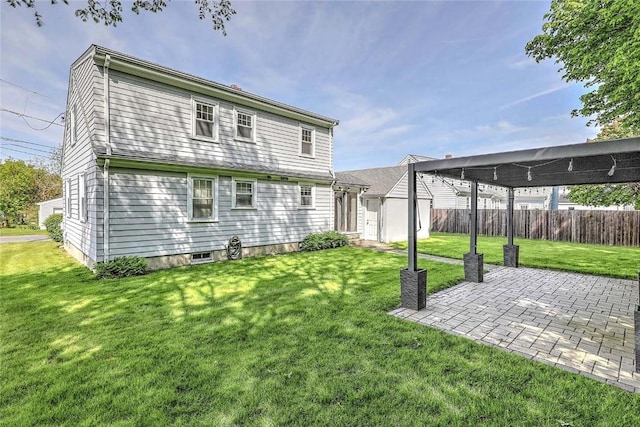 14 Manchester St, Bristol, RI 02809 - rear view of house with a patio area
