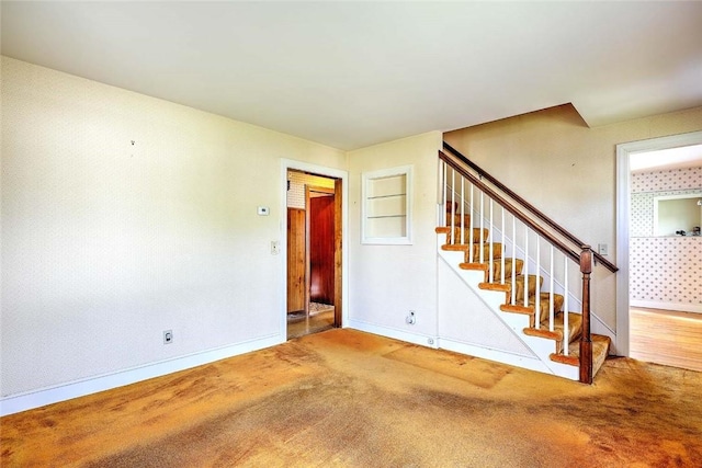 14 Manchester St, Bristol, RI 02809 - staircase with baseboards and carpet flooring