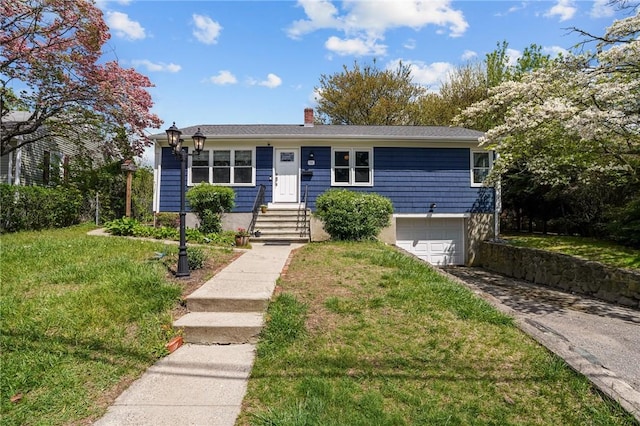 14 Simpson St, North Providence, RI 02911 - view of front of home with a garage, driveway, a front yard, and a chimney