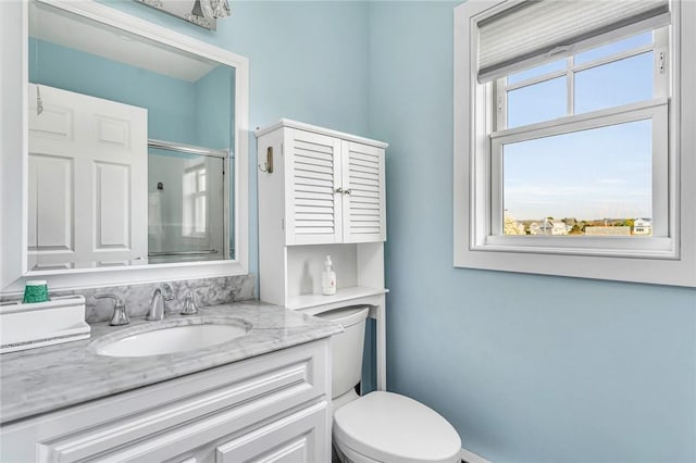 32 Breach Dr, Westerly, RI 02891 - bathroom featuring toilet, vanity, and an enclosed shower