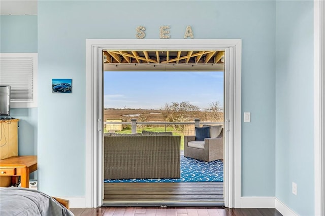 32 Breach Dr, Westerly, RI 02891 - doorway with wood finished floors and baseboards