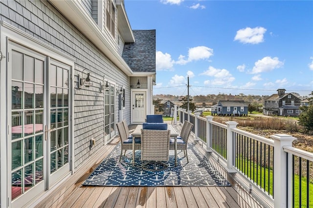 32 Breach Dr, Westerly, RI 02891 - deck with outdoor dining space and a residential view
