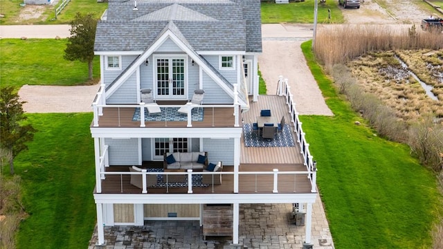 32 Breach Dr, Westerly, RI 02891 - back of house featuring a balcony, outdoor lounge area, french doors, cooling unit, and roof with shingles