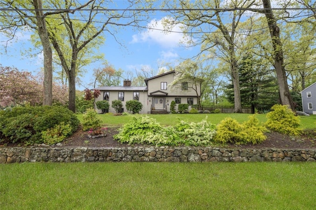 218 Burnt Cedar Dr, North Kingstown, RI 02852 - view of front of home with a chimney