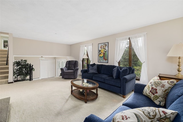 218 Burnt Cedar Dr, North Kingstown, RI 02852 - carpeted living area with stairs