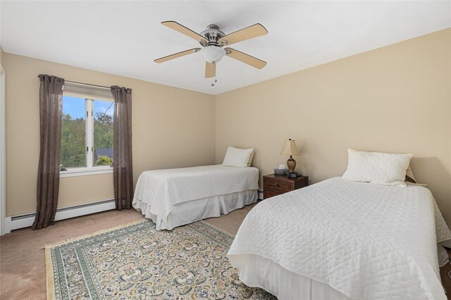 218 Burnt Cedar Dr, North Kingstown, RI 02852 - bedroom featuring light colored carpet, baseboard heating, and ceiling fan