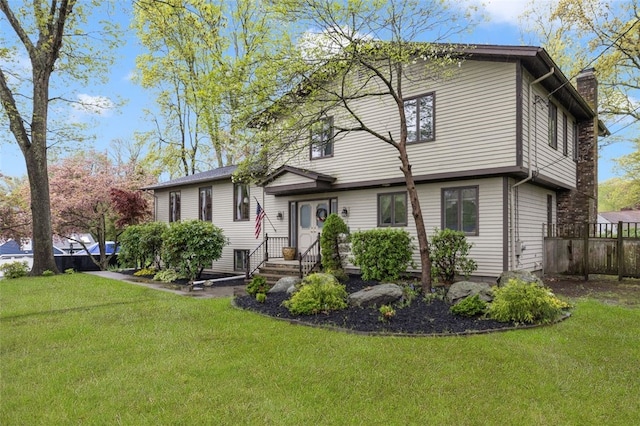 218 Burnt Cedar Dr, North Kingstown, RI 02852 - split level home featuring a chimney