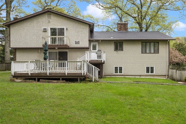 218 Burnt Cedar Dr, North Kingstown, RI 02852 - back of property with a chimney, a wooden deck, and a shingled roof