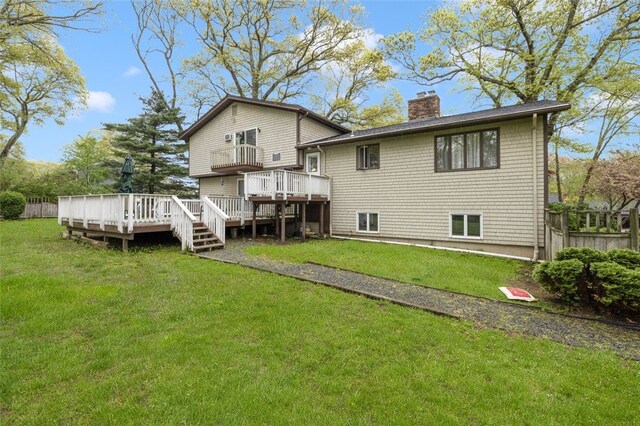 218 Burnt Cedar Dr, North Kingstown, RI 02852 - back of house with a chimney and a wooden deck